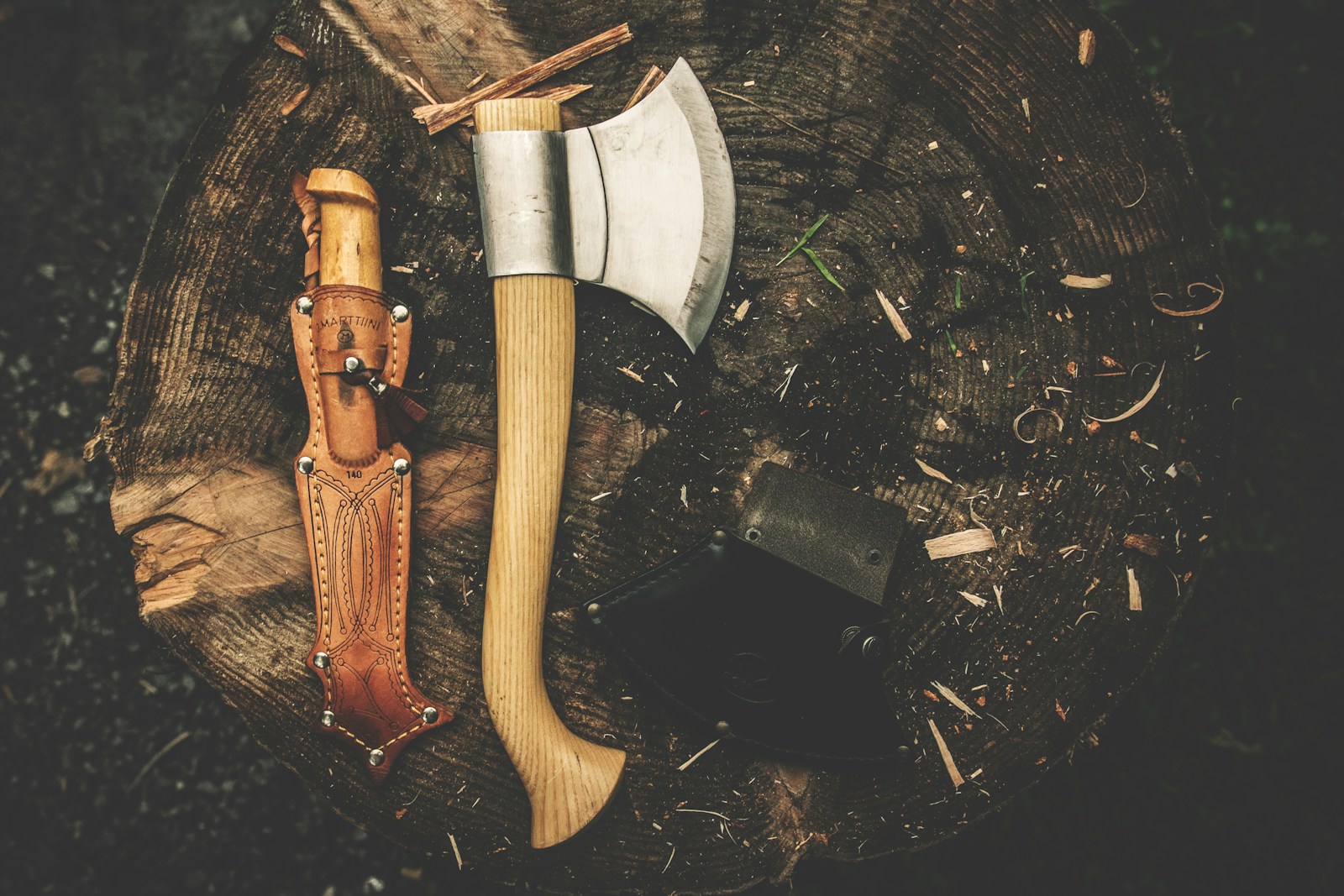 The Ultimate First-Time Camping Essentials: A Beginner’s Checklist ax and knife with sheath