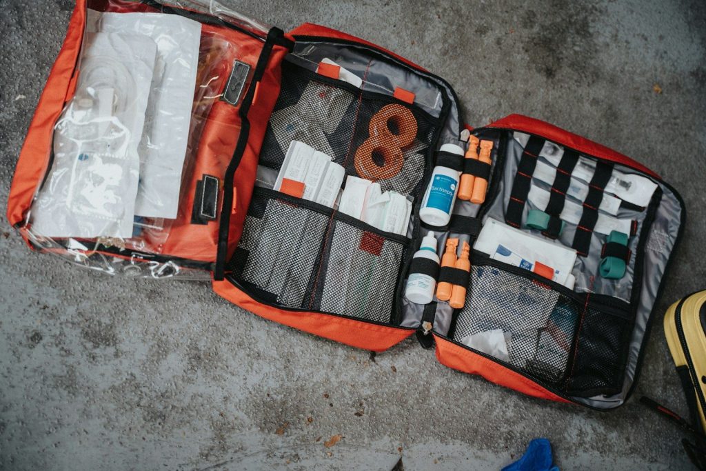 Essential First Aid Kit for Camping: Be Prepared for Anything orange white and black bag