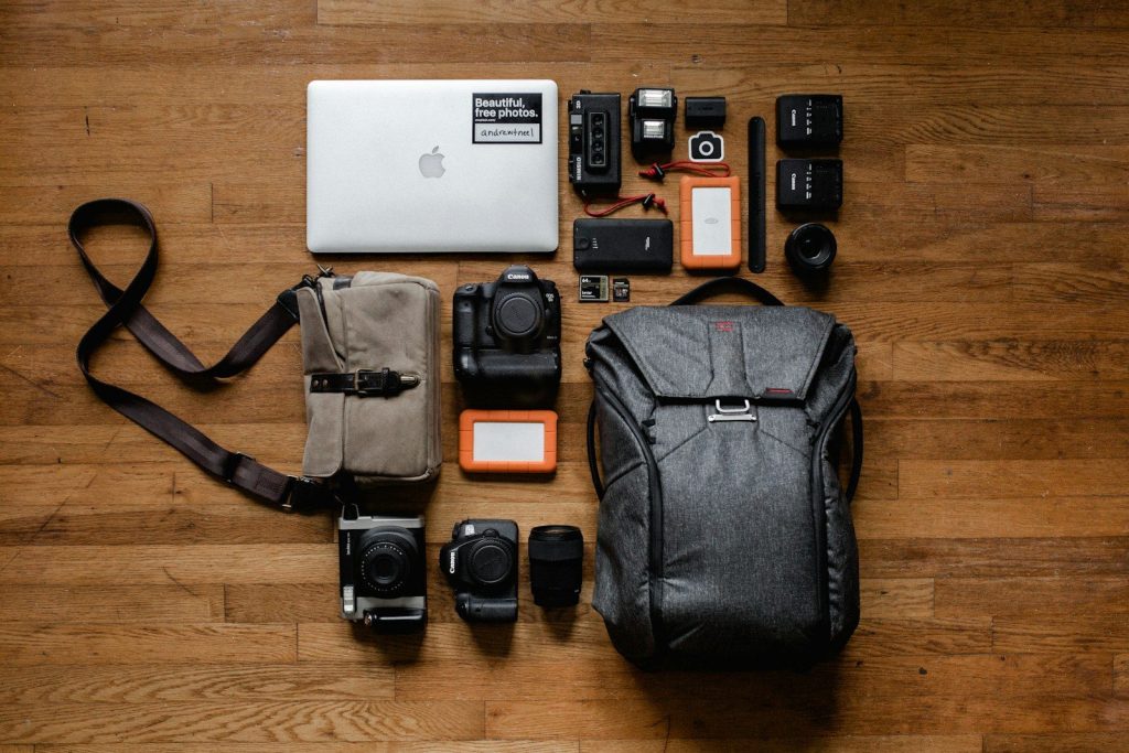 Best Backpacks for Camera Gear: Vetted Storm-Proof Transport Systems for Creators black DSLR cameras and lenses