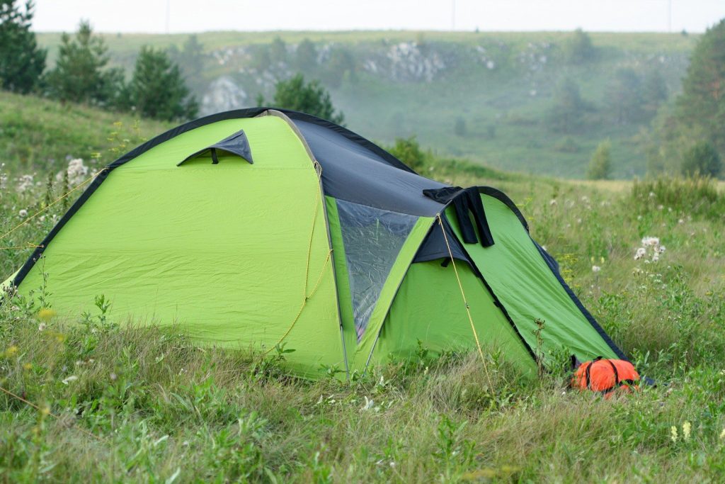 Best Tents for Windy Conditions: Vetted Storm-Defying Backcountry Fortresses green dome tent on green grass field during daytime